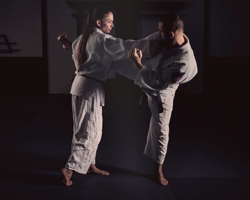 man-kicking-woman-during-krav-maga-training-2022-01-20-01-52-24-utc2